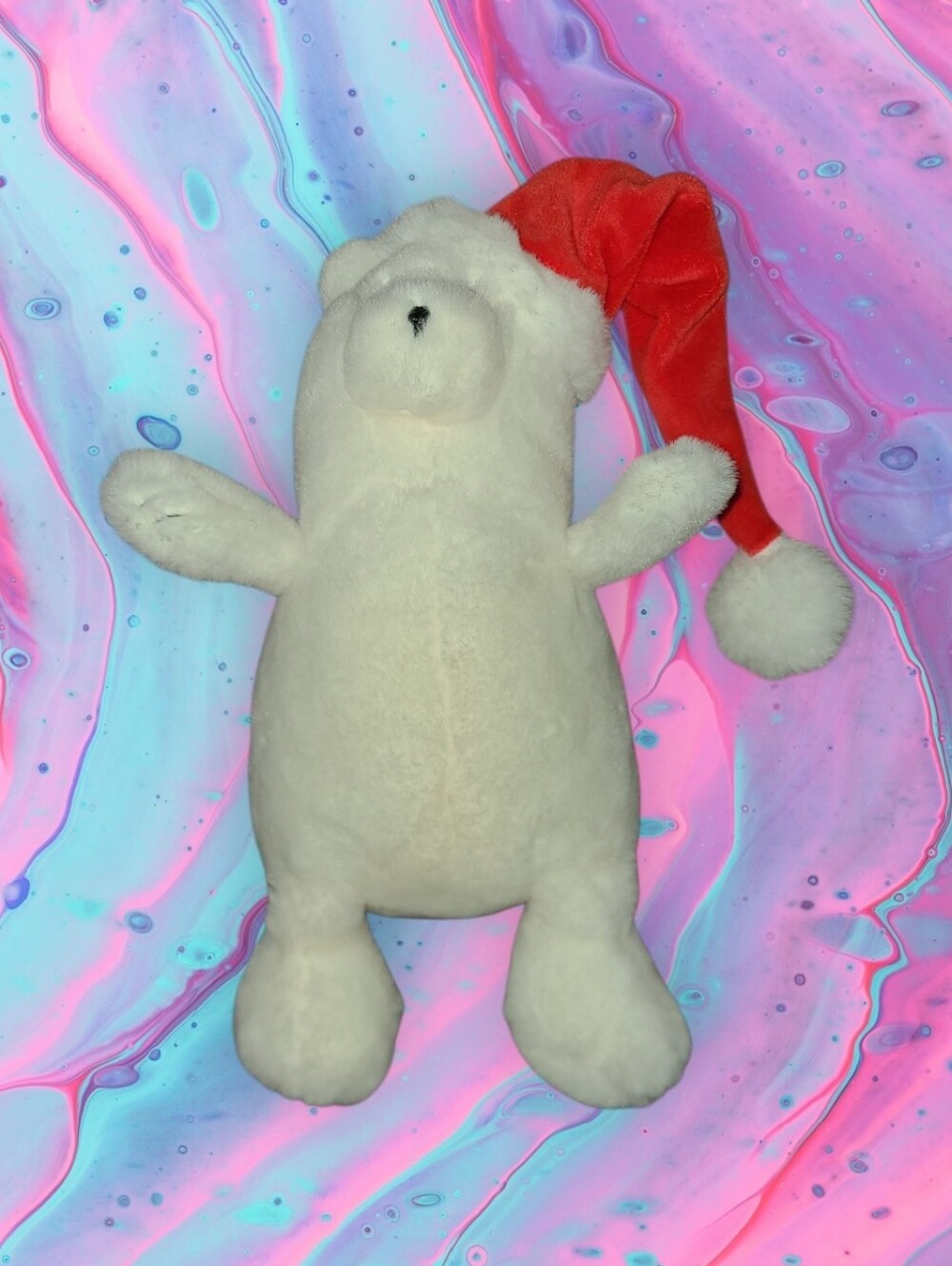 Polar bear in Santa hat plush